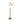 Modern floor lamp with curved gold arm, white lampshade, and dark wooden base