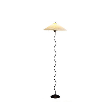 Floor lamp with pleated shade on a white background