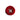 A round red plush cushion designed to look like a button, featuring a light blue fuzzy cross-shaped buttonhole and a beige wooden button in the center, isolated on a white background.