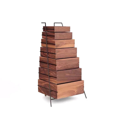 Stack of wooden boxes with a metal stand on a white background
