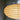Close-up of a wooden lampshade against a dark background