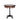 A round accent table with an oakwood top and an iron base, featuring hand-carved details.