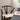 Black chair with woven seat in a room setting