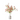 Artificial Cosmos flowers in pink, arranged in a white vase with a geometric pattern.