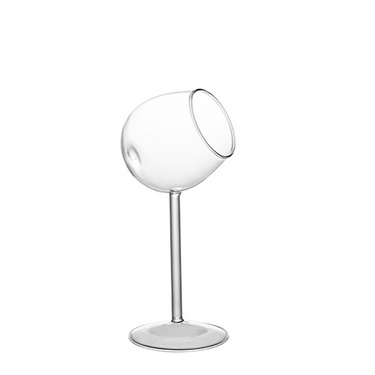 A single clear, lead-free crystal cocktail glass with an oblique design on a white background.