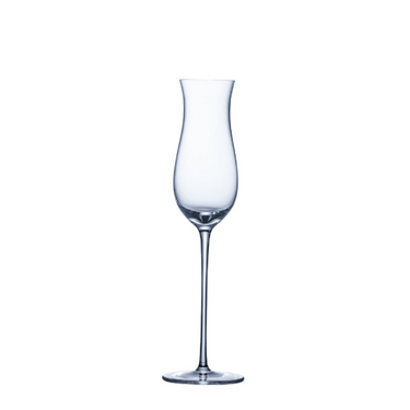 A single clear sparkling wine glass with a long stem and a flared bowl.