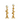 Pair of modern gold metal candle holders with stacked pebble design holding white candles