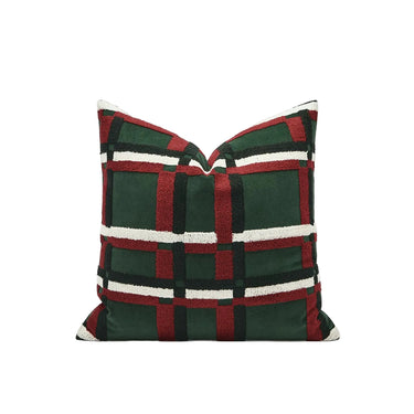 A square throw pillow with a textured plaid pattern in forest green, red, and white, displayed against a light gray background with Chinese text overlays.
