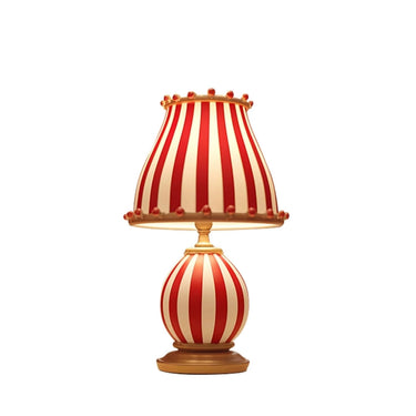 Vintage-style red and white striped table lamp with decorative gold base and trim