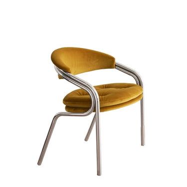 Modern mustard velvet upholstered chair with curved chrome metal frame, stylish designer home décor