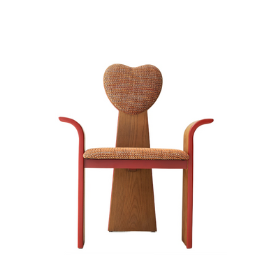 Heart-shaped back wooden chair with red arms and orange patterned cushion, modern home décor