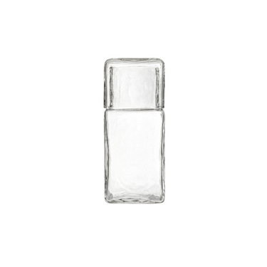 A clear glass rectangular bottle with a matching glass cap, shown against a white background with a black border.