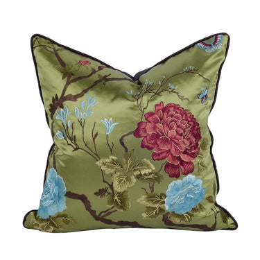Olive green decorative cushion with embroidered red and blue floral designs, ideal for elegant home décor