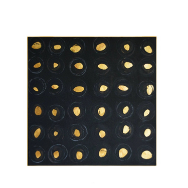 Abstract wall art featuring black circles with gold leaf shapes, modern home décor
