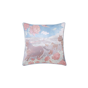 Decorative pillow with horse and floral design on a white background