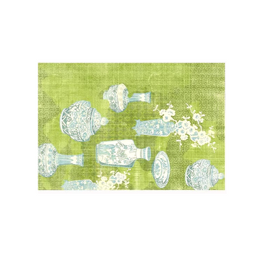 Decorative vintage blue and white ceramic vases and jars with floral design on textured green background
