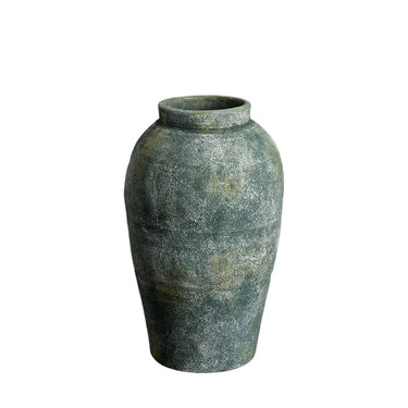 A handcrafted green ceramic vase with a textured surface, resembling a lichens-like pattern.