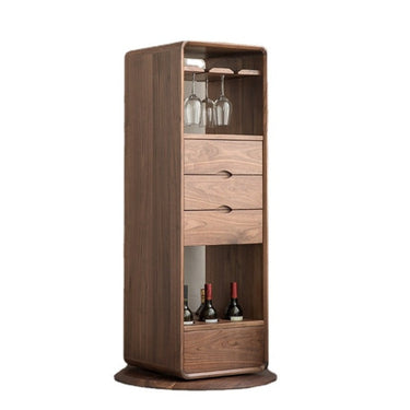 A brown swivel bar cabinet with glasses on the top shelf and bottles on the middle shelf, made of American walnut wood.