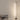 Modern minimal floor lamp in a minimalistic living room setting