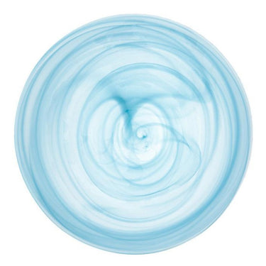 A blue glass plate with a marble swirl pattern, resembling candy work, and two smaller bowls in the background.