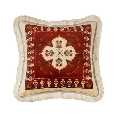 Decorative square cushion with beige fringe and red floral ornamental pattern