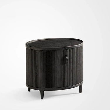 A round bedside table made of solid America oakwood/walnut wood with a wood veneer tambour door.