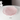 A pink glass plate with an irregular shape, handmade in Japan.
