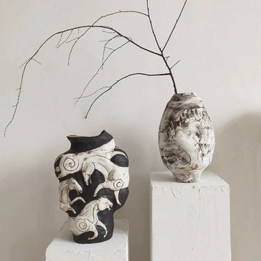 crinkled porcelain vase with irregular shape
