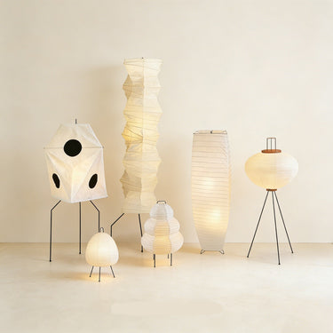 Collection of various floor lamps on a plain background