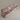 Pink textured sofa on a beige background